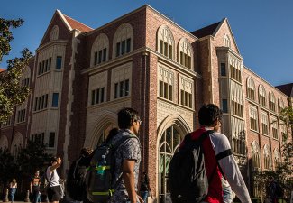 People walking outside of Wallis Annenberg Hall