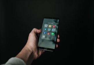 Photo of a person using social media