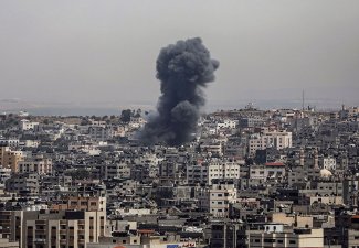 Smoke rises after Israeli airstrikes on Gaza City, the Gaza Strip, Palestine, May 12, 2021.