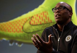 Photo of Trevor Edwards with a Nike shoe background