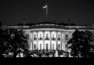 A black and white picture of the White House.