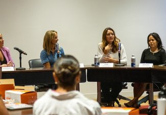A previous panel on women in sports, held in 2023. (From left to right: moderator Farren Benjamin, Jennifer Prince, Erin Bice, and Charlene Riofrio.)
