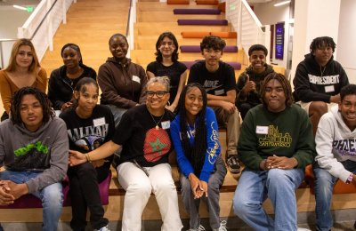 “Dr. Robin” — USC Annenberg Associate Professor Robin Stevens (front row, center left) — shares a moment with program participants. (Photo/Areon Mobasher)