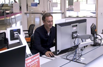 Photo of a person using a computer