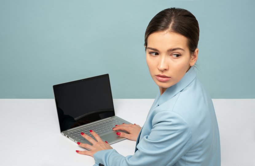 Photo of a person using a laptop