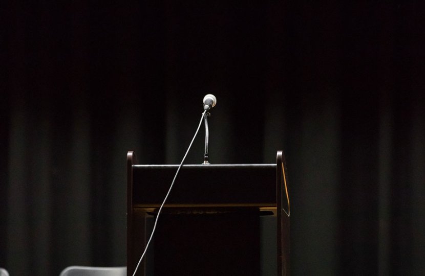 Photo of a microphone on a podium