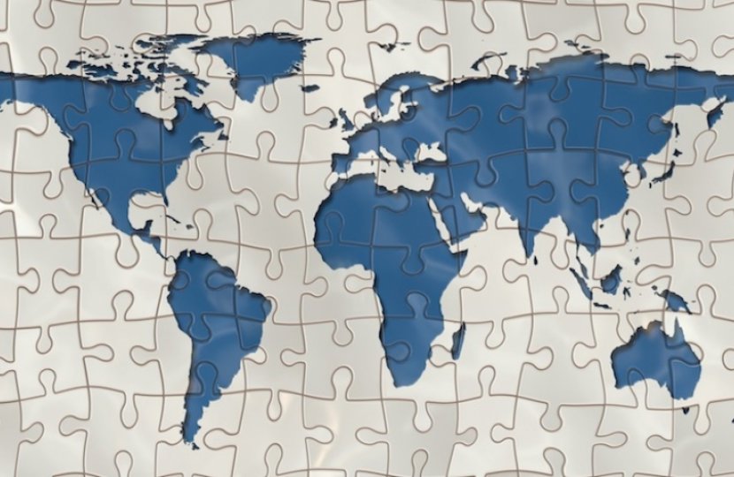 Photo of a world map made up of puzzle pieces