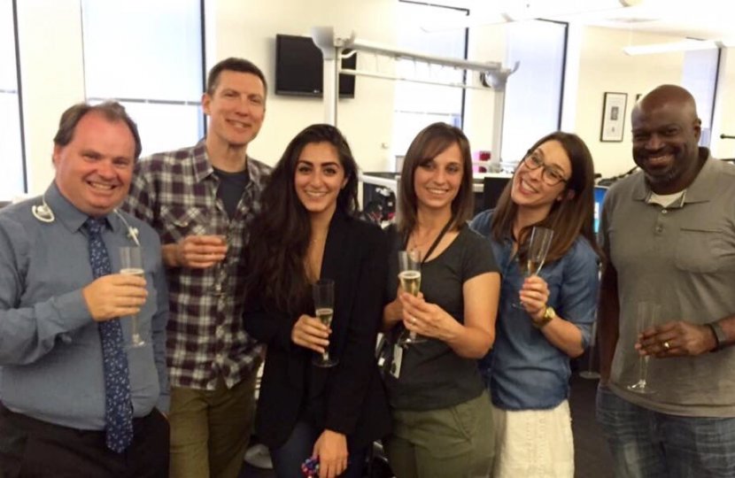 Los Angeles Times staff celebrate the Pulitzer on April 18, including USC Annenberg graduates Sarah Parvini (third from left) and Laura Nelson (fifth from left). Photo courtesy of Laura Nelson. 